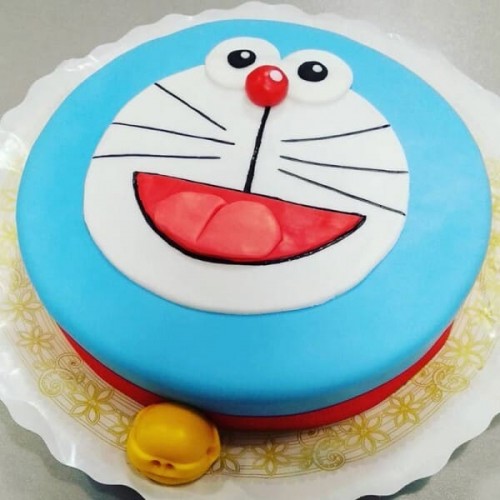 Cheering Doraemon Fondant Cake Delivery in Noida