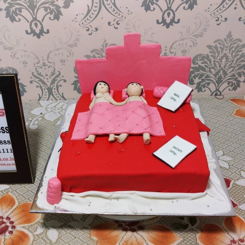 Naughty Couple Having Fun Fondant Cake in Noida
